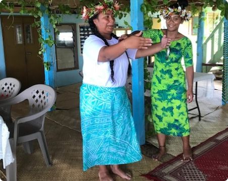 two people in traditional outfit