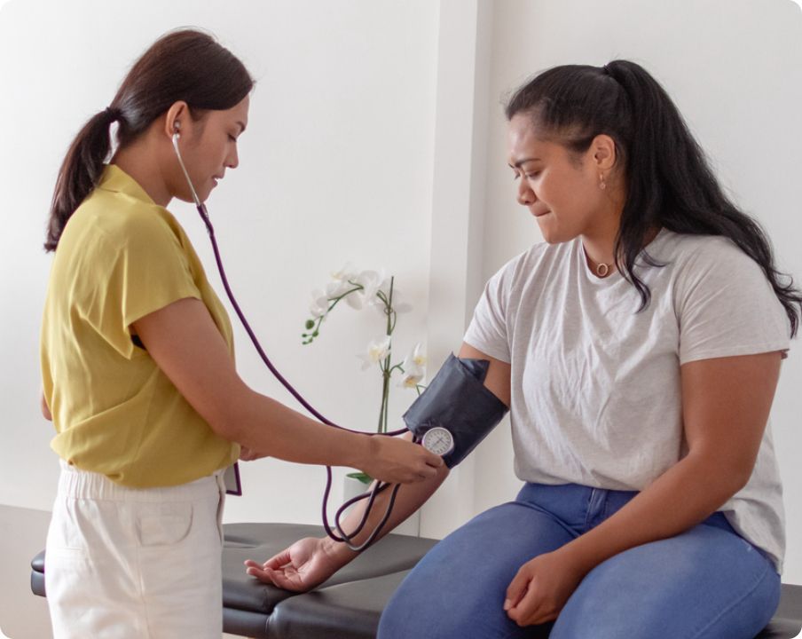 person checking blood pressure